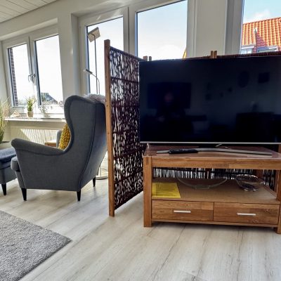 Ferienwohnung Strandflieder - TV mit Sessel